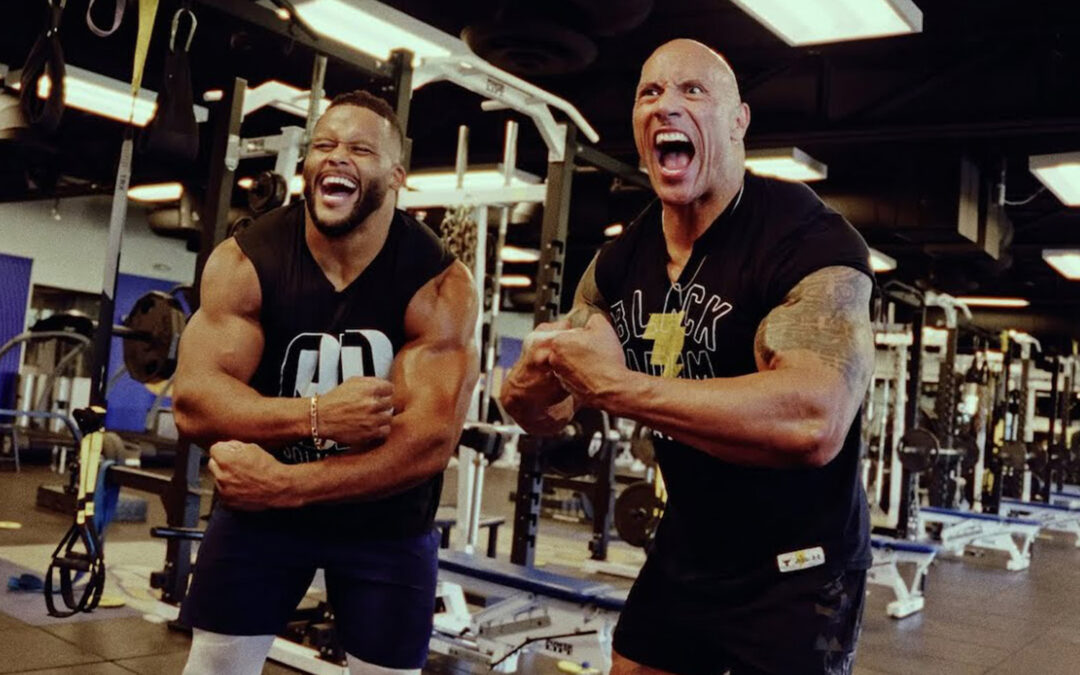 Watch The Rock Do a Killer Core Workout With NFL Player Aaron Donald